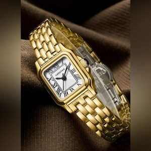 NWT boxed covered plastic Cheetah Gold Watch with Black and White Dial